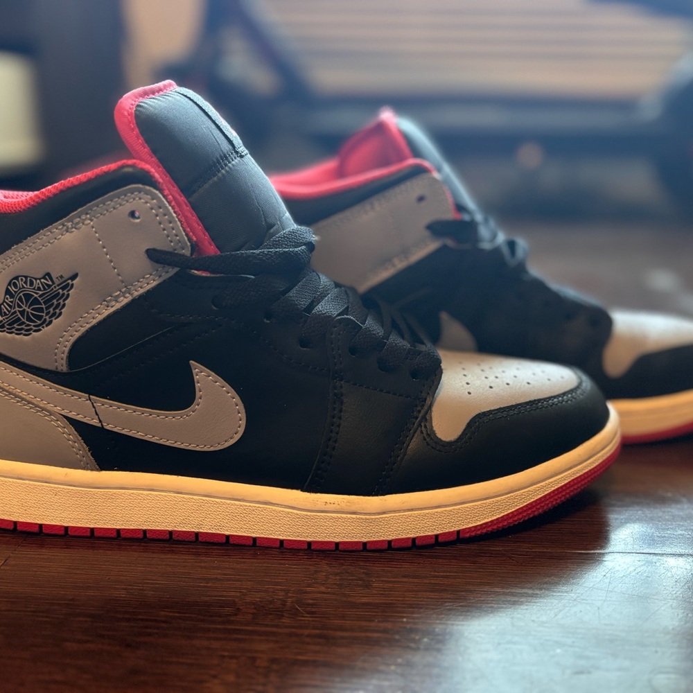 Nike Black and Gray Sneakers with Iconic Design